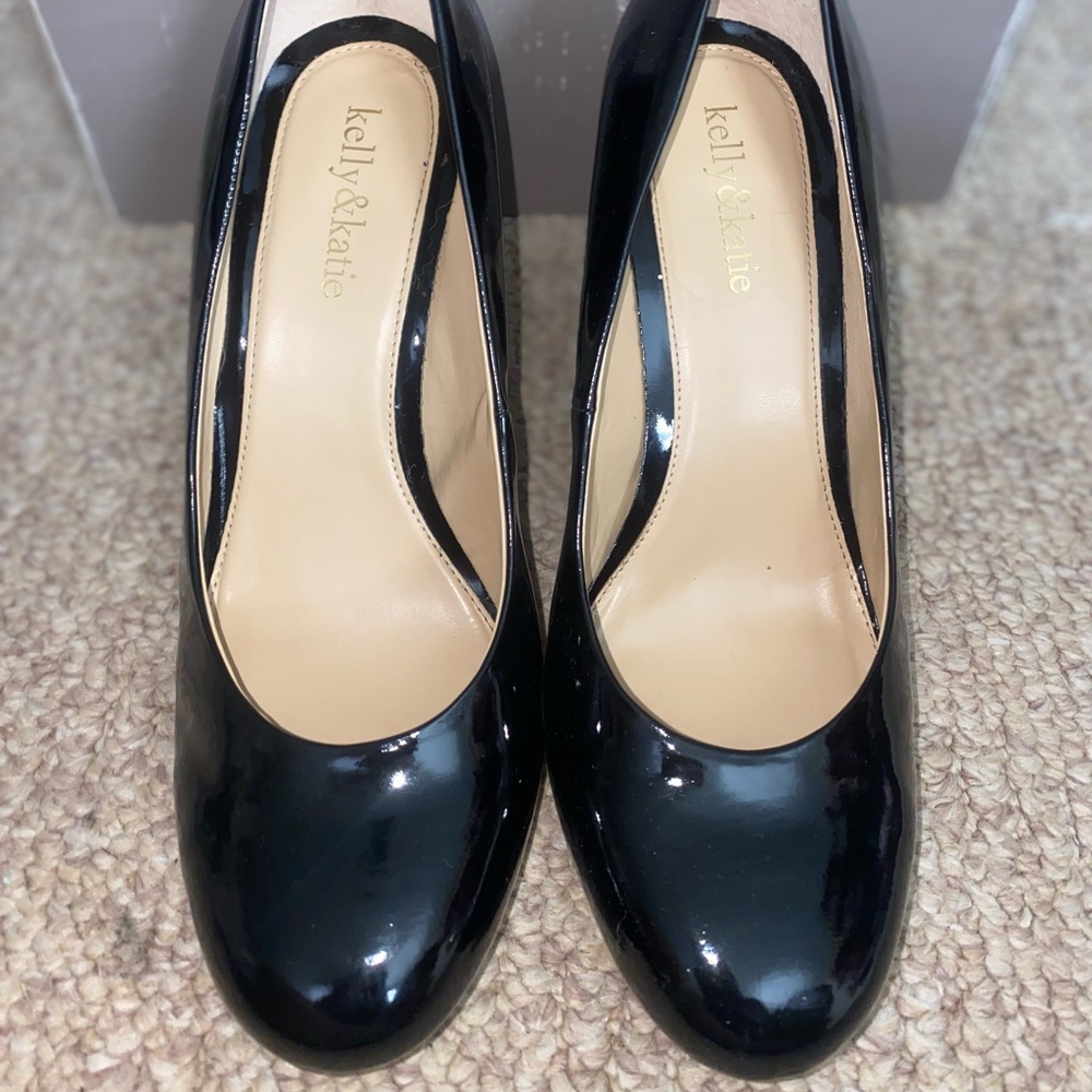 Kelly and Katie black shiny pumps.